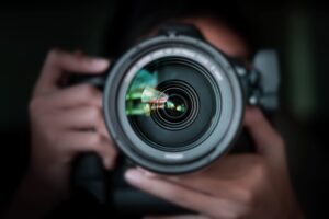 Man taking photos with a DSLR camera