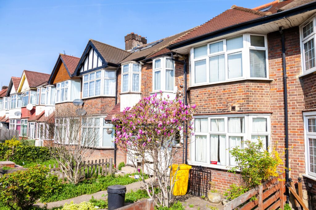 Typical brick town houses with a little garden in London. England, UK