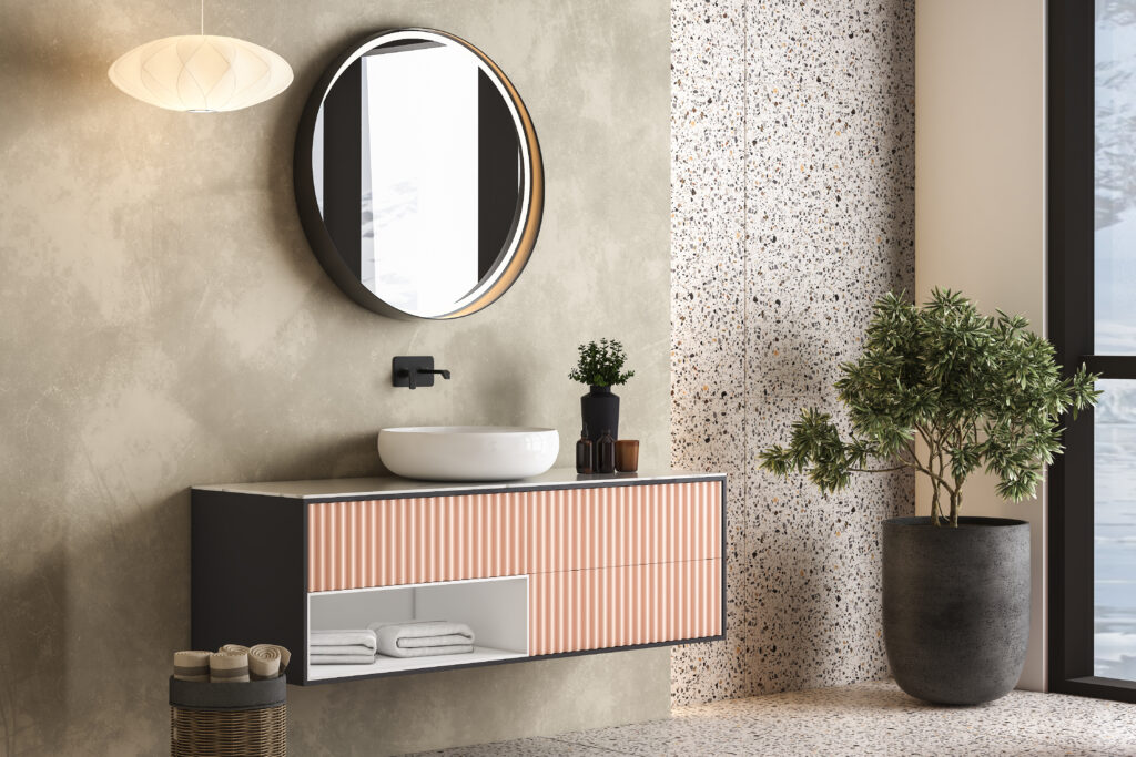 Modern minimalist bathroom interior, modern pink bathroom cabinet, white sink, wooden vanity, interior plants, bathroom accessories, orange-white bathtub, concrete wall, terrazzo flooring.3d rendering