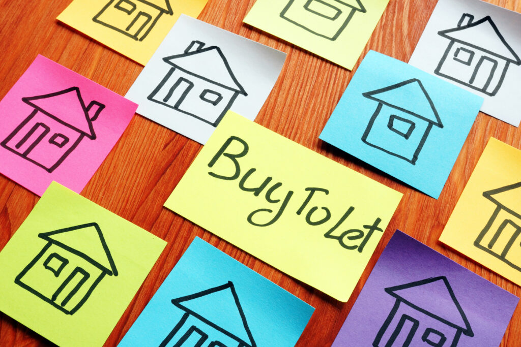 Buy To Let Mortgage sign and drawn homes.