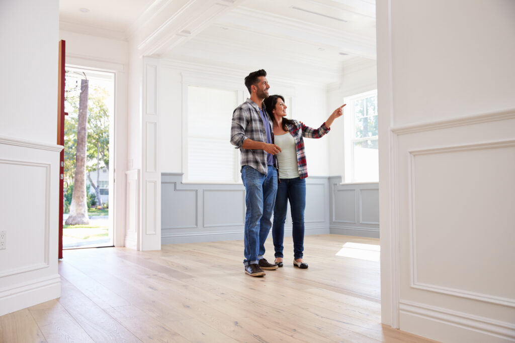 Image of a couple viewing a house