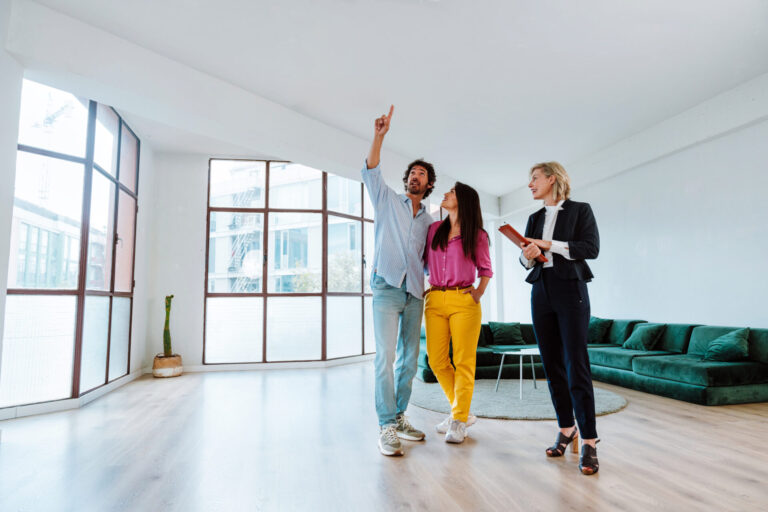 Couple viewing a home with estate agent in Doncaster