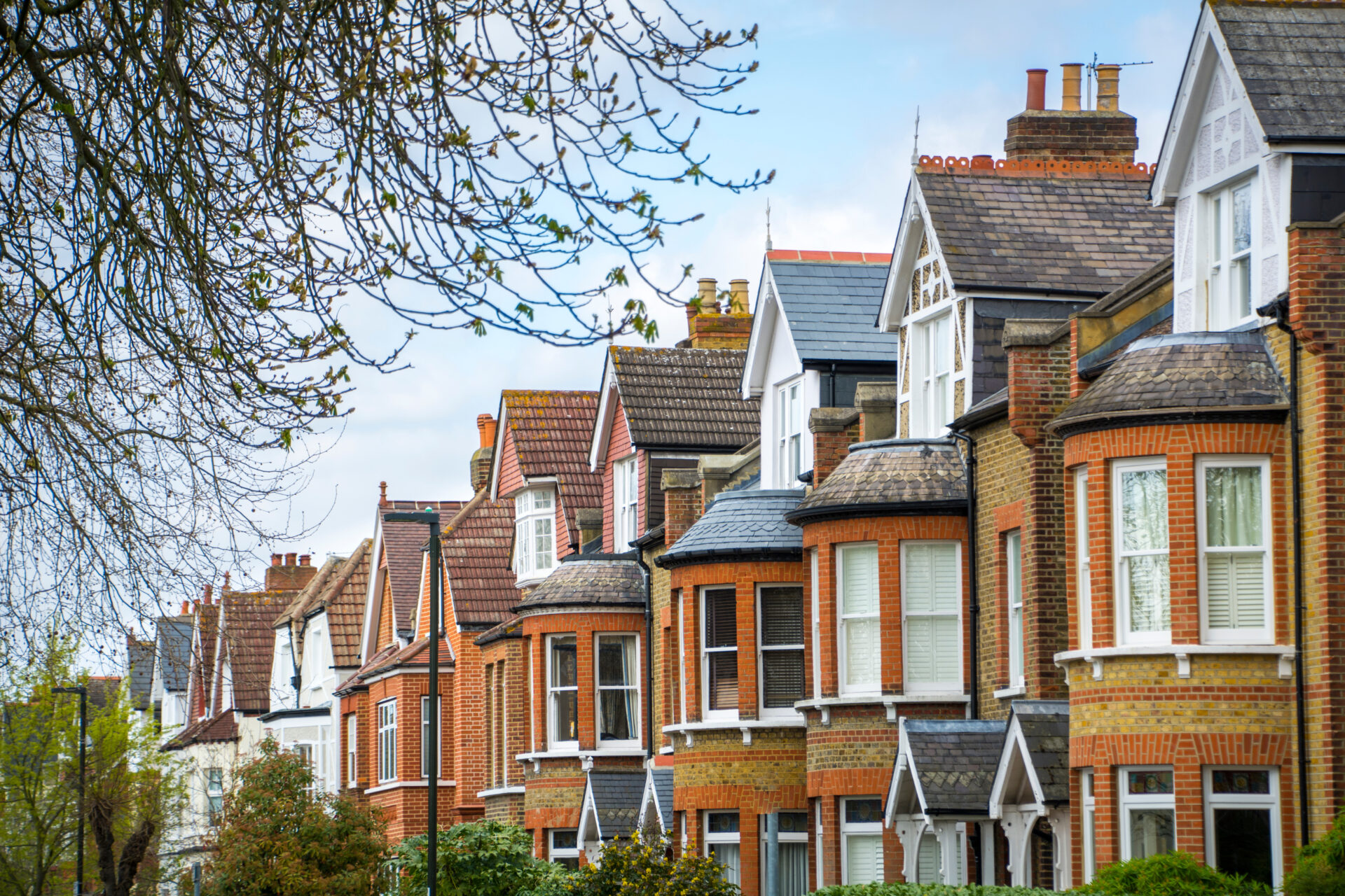 Row of traditional terraced houses in Pontypridd representing high-demand properties for first-time buyers