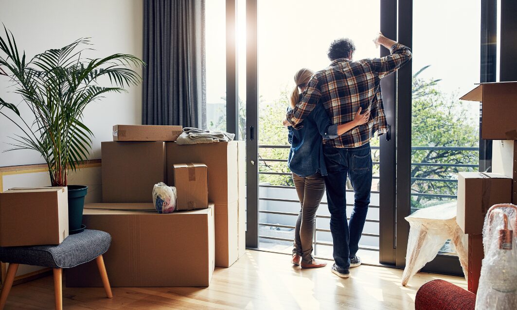 Couple moving into a rental apartment in DN1 Doncaster city centre