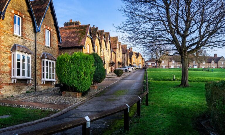 Row of traditional homes near green space in Cannock reflecting growing residential appeal