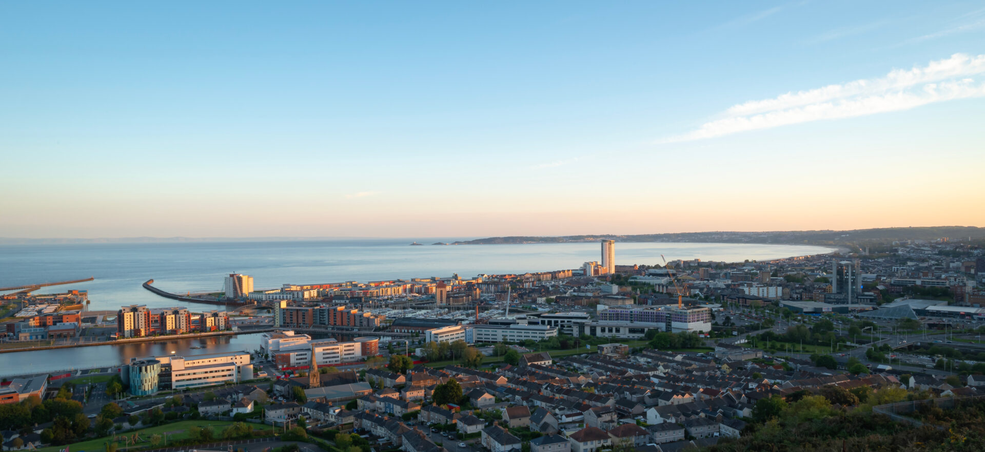 Coastal view of Mumbles SA3 Swansea with seafront homes and marina