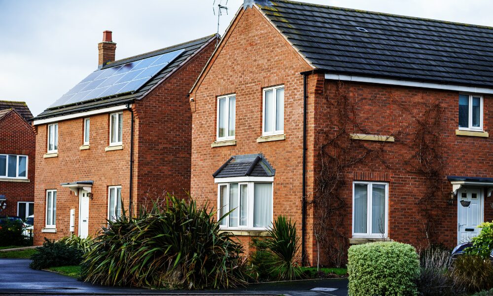 Row of traditional houses in a leafy residential area representing Christchurch property market growth