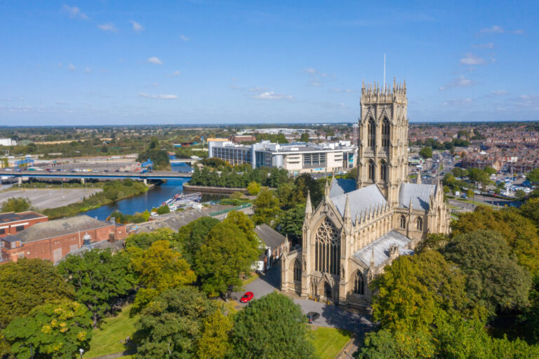 Aerial view of Doncaster city centre and Doncaster Minster showing residential neighbourhoods popular with NHS staff renters.