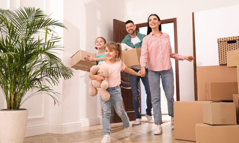 Family moving into a new home in Churwell LS27, highlighting the area's appeal for buyers, renters and growing families in South Leeds.