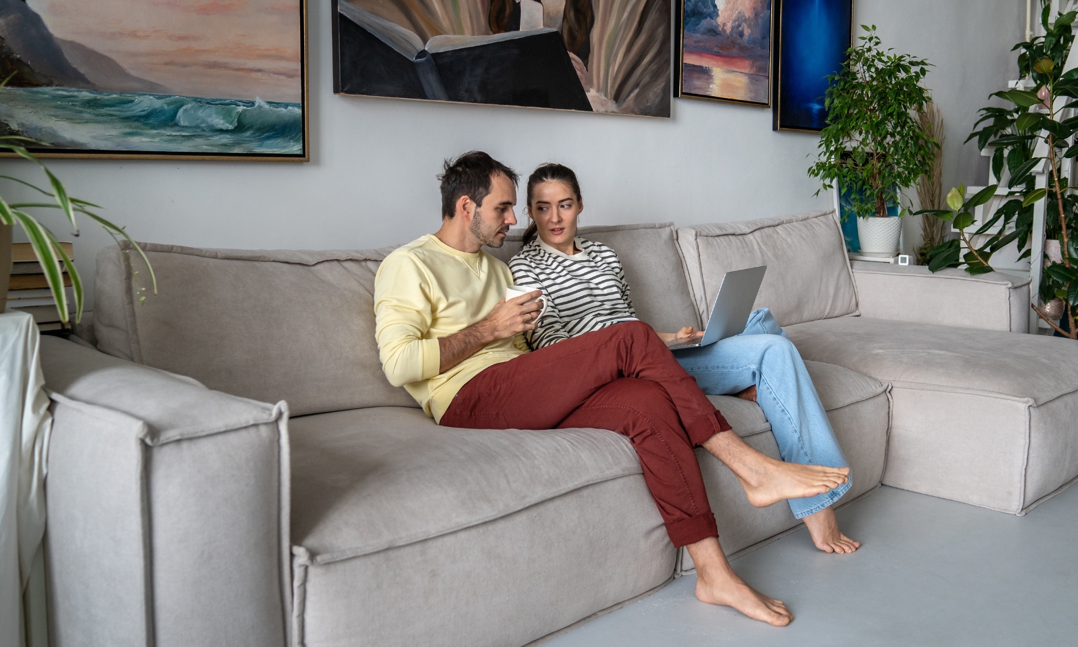 Couple relaxing in their Lindfield RH16 home, showcasing the village lifestyle, strong community appeal and quality of life in Mid Sussex.