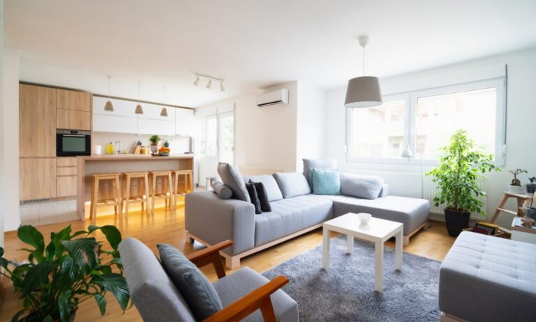 Bright, modern open-plan living room and kitchen in a contemporary family home, showcasing the style of properties that appeal to buyers and renters considering living in Moreton Hall IP32.