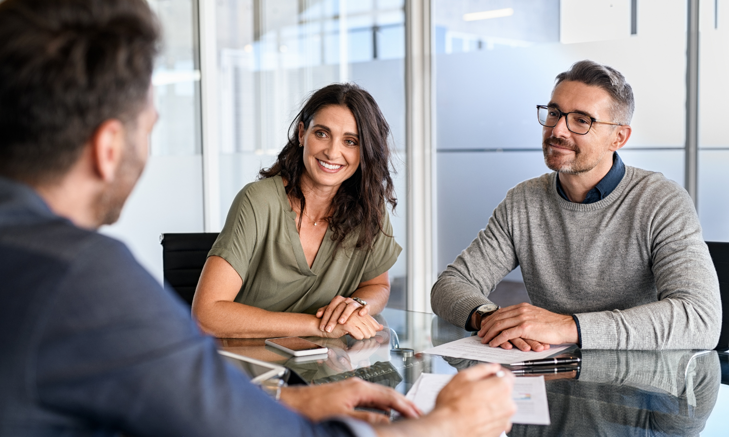 Couple discussing a rental agreement with a letting agent in Tadley