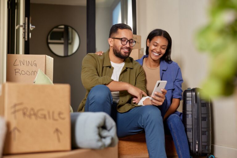 Young first-time buyers viewing an affordable family home in St Helens, highlighting the August 2026 property market and popular neighbourhoods such as Thatto Heath and Haydock.
