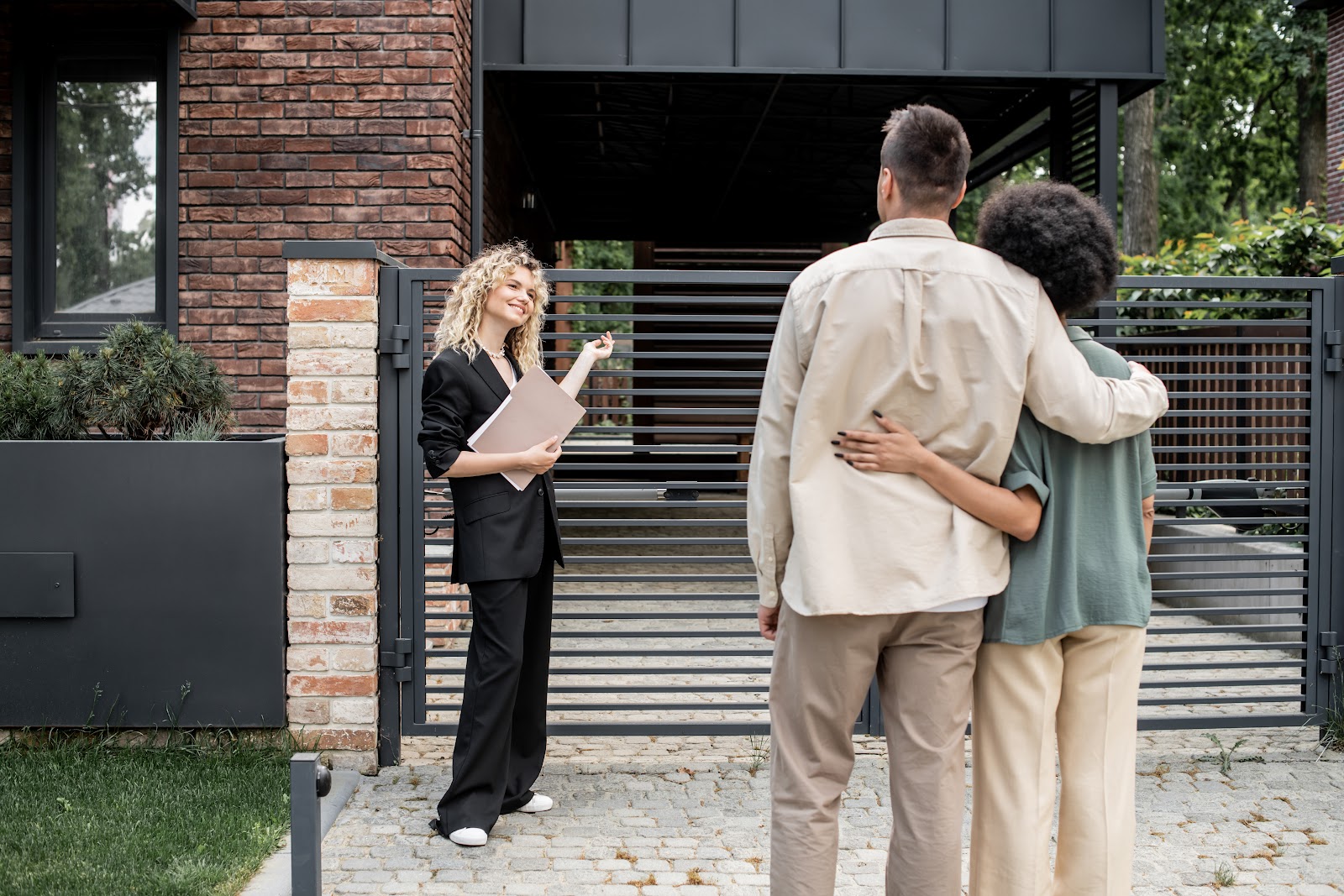 Couple viewing a house in Stone with an estate agent
